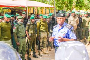 Picture of policemen deployed to Tafawa Balewa with CP Sanda at the middle.