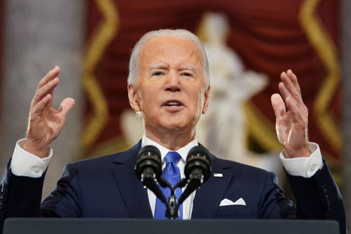 Biden calls Trump "a threat to democracy" on Capitol riot anniversary