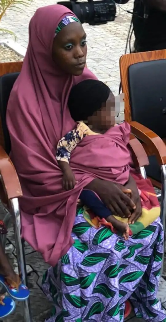 Rescued Chibok girl who married 3 Boko Haram fighters says she can’t wait to reunite with her husband