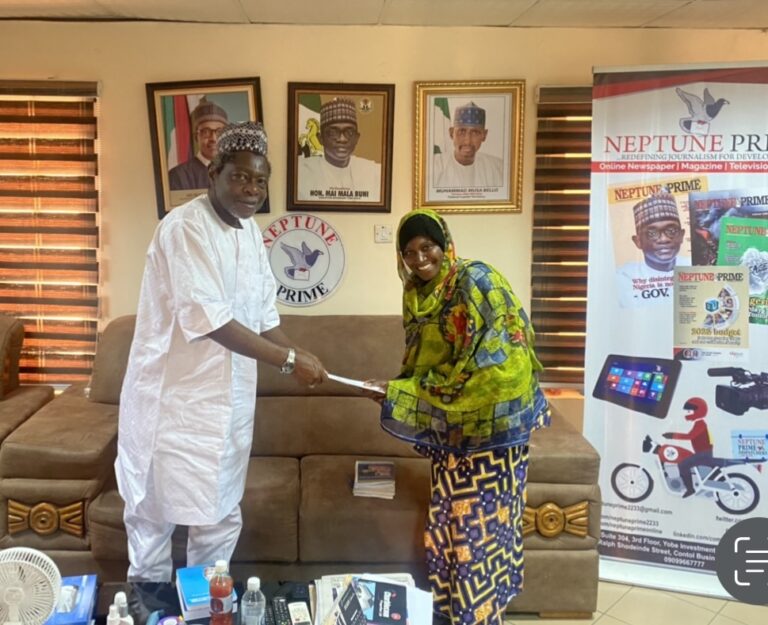 Winner of Neptune Prime poetry competition, Rita Andrawus, receives prizes in Abuja