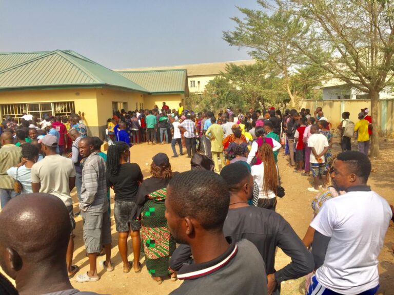 PVC Collection: Officer flogs prospective voters with no hope at Mararaba centre (Photos)