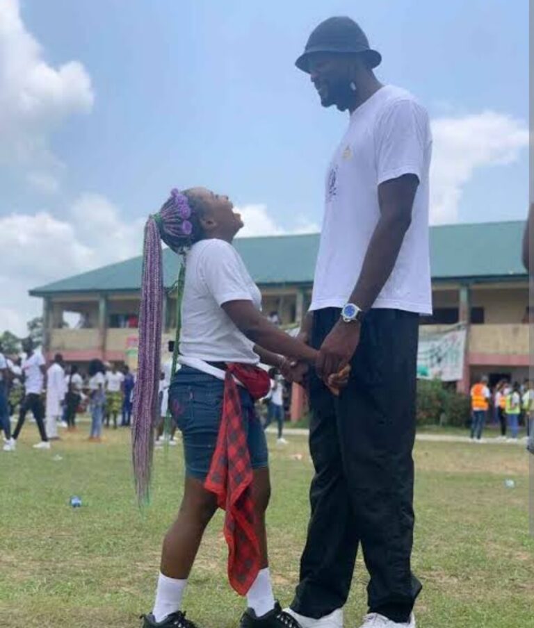 Man denies relationship with 3ft lady seen in viral photos from NYSC camp, threatens legal action