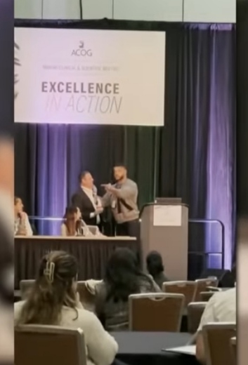 Angry husband slaps doctor amidst sexual assault accusations at medical event (Video)