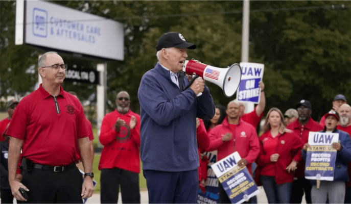 President joins striking workers to demand improved benefits