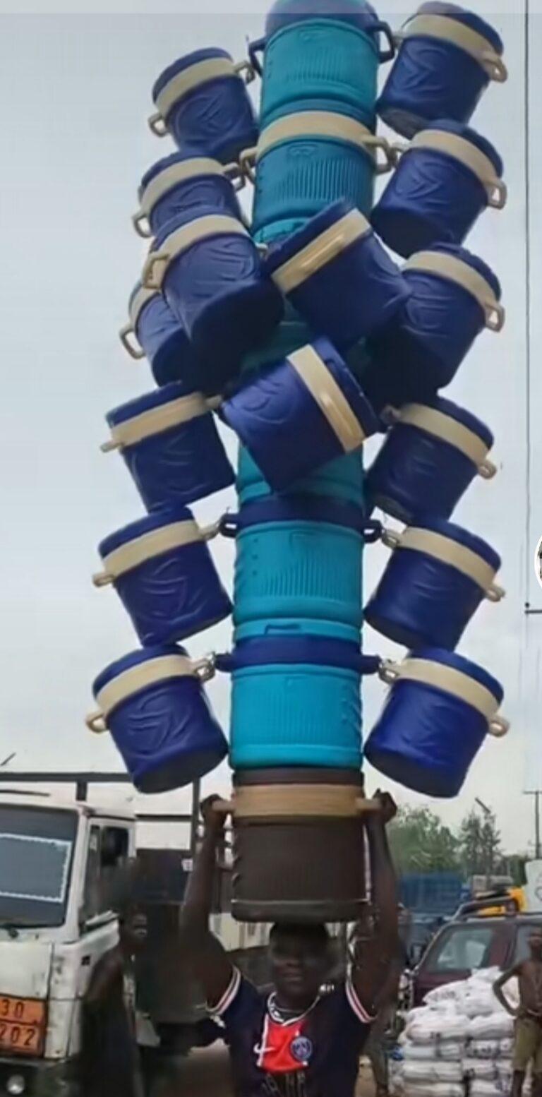 Video of Nigerian man carrying 20 coolers on head sparks trend on TikTok