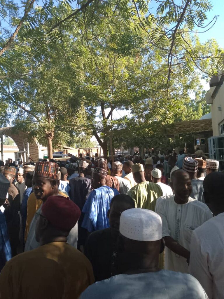 The funeral prayer took place at the Palace of the Emir of Fika in Potiskum, drawing a massive crowd of friends, relatives, and others.