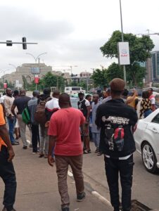 Pro-government protesters storm Abuja stadium in 12 buses