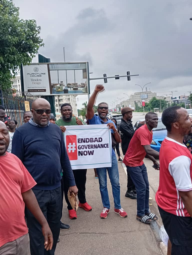 Pro-government protesters storm Abuja stadium in 12 buses