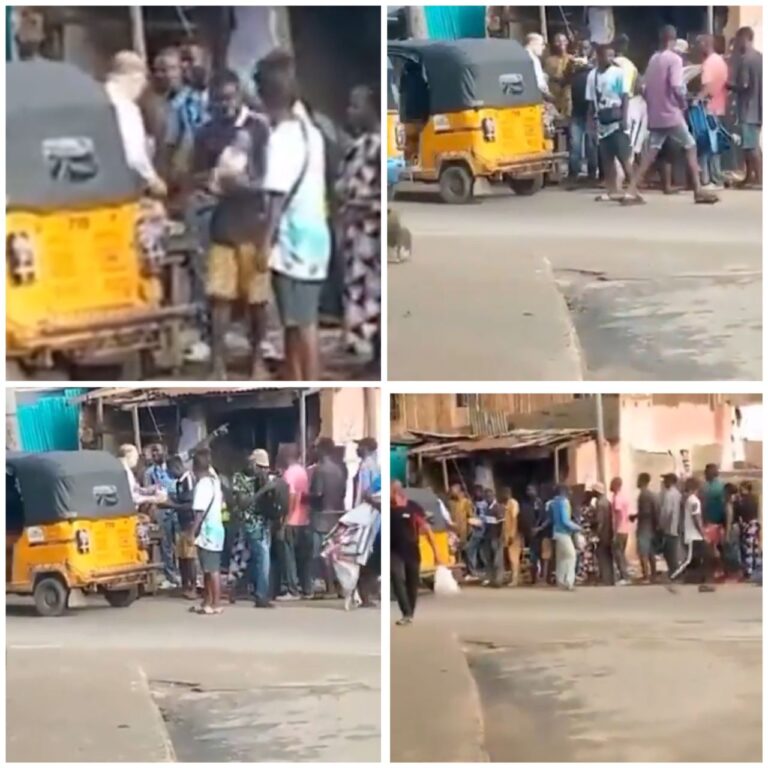 Viral video shows Nigerians receiving bread, bibles from missionary in Lagos