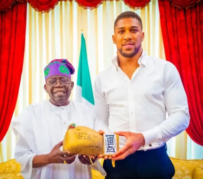 Anthony Joshua visits President Tinubu in Lagos, presents autographed glove