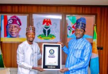 Yobe record holder, Abdulrahaman, presents Guinness World Record certificate to Gov. Buni (Pictures) Yobe record holder, Abdulrahaman, presents Guinness World Record certificate to Gov. Buni (Pictures)