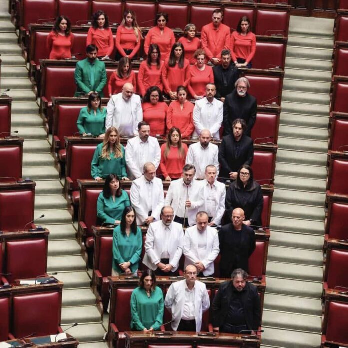 Italian lawmakers dressed up in Palestine's flag colours to protest Italy's complicity in Israels' genocide