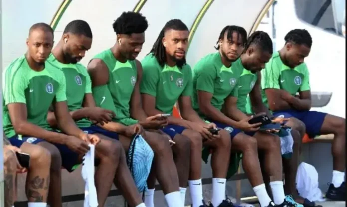 Super Eagles take flight as Iwobi, Bassey, Aina lead 13-man squad to Uyo