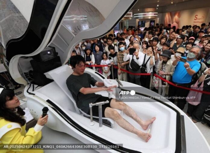 Japan unveils commercial human washing machine